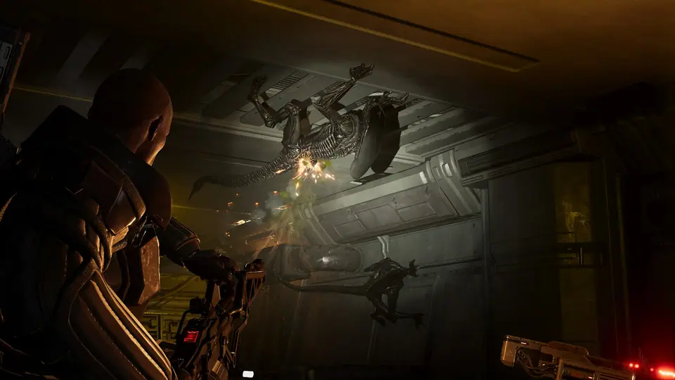 Marine squad aiming upward at a Xenomorph attack